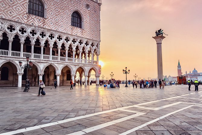 Skip the line Doge's Palace Guided Walking Tour in Venice - Stop 1: St. Mark’s Square and the palace façade
