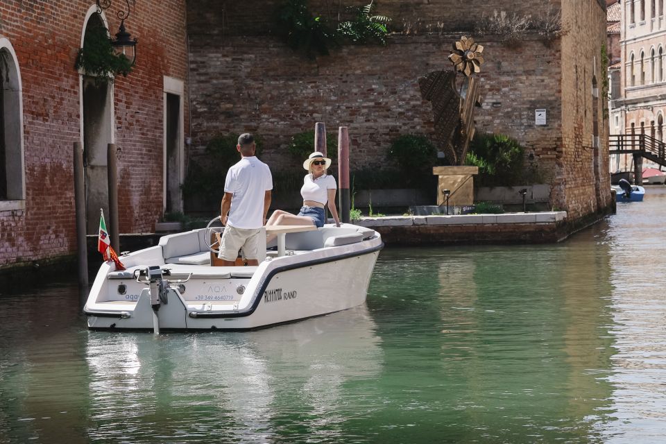 Venice: Hidden Canals on Electric Boat - The Guide Moment: Landmarks, Old Neighborhoods, and Local Details